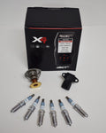 A box with some different types of spark plugs