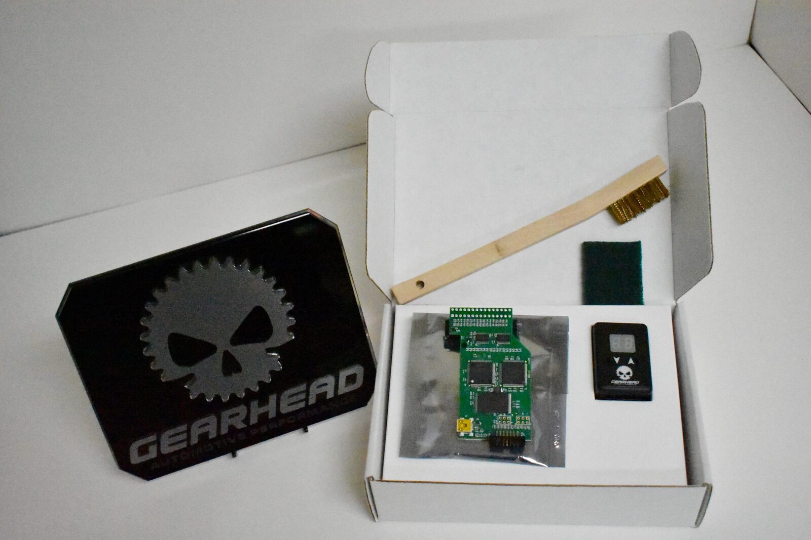 A box with some electronics and a sticker