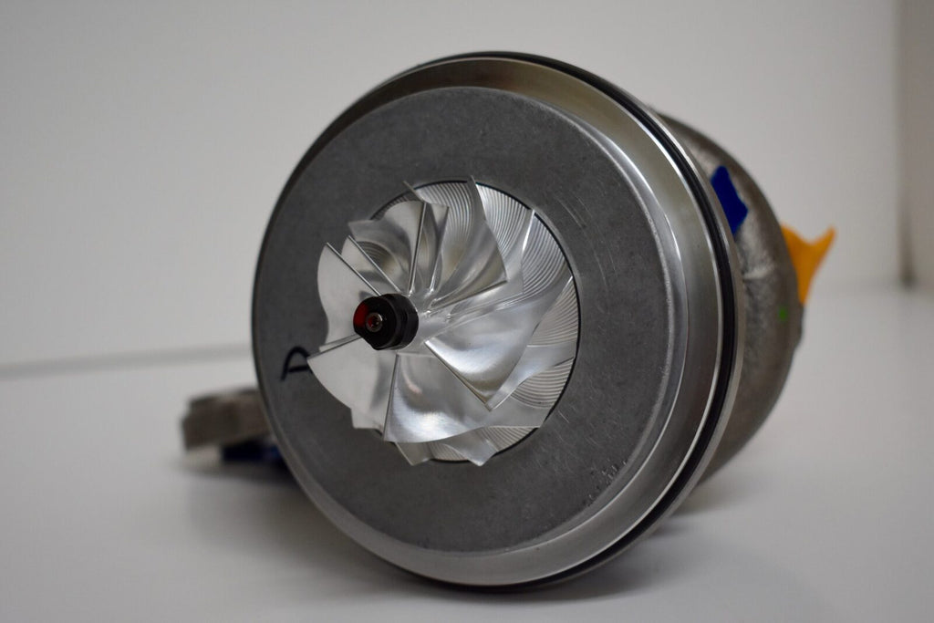 A close up of the turbine on top of a machine