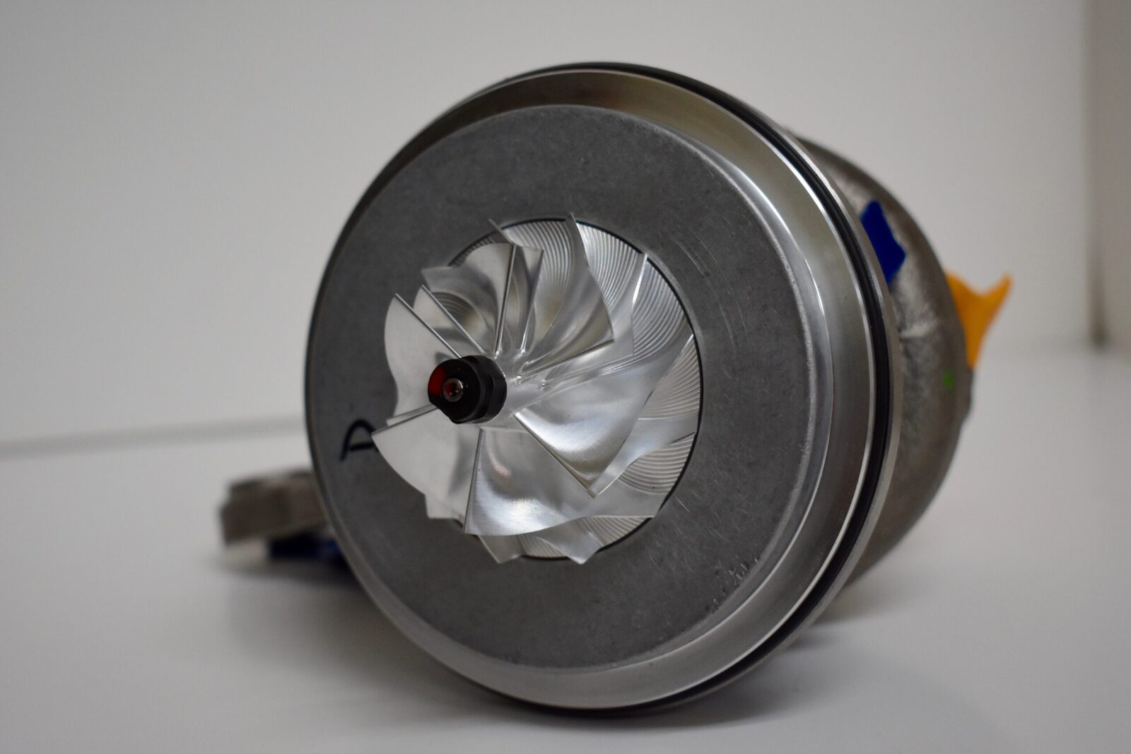 A close up of the turbine on top of a machine