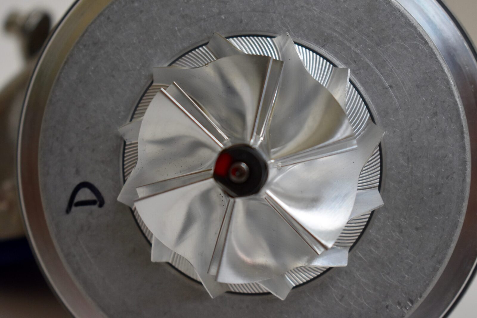 A fan that is sitting on top of a table.