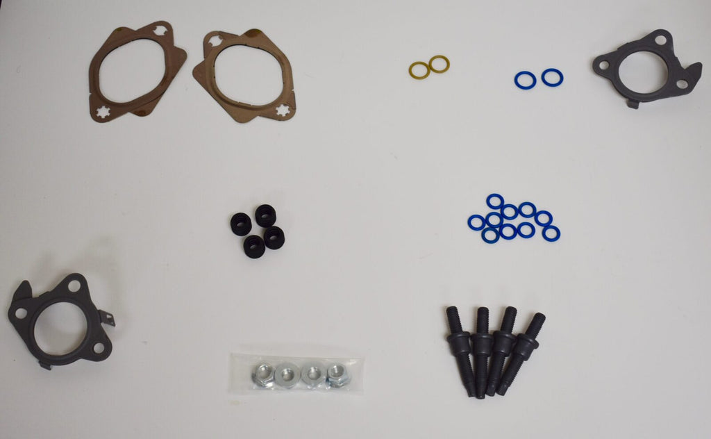 A white table with some parts of the same type