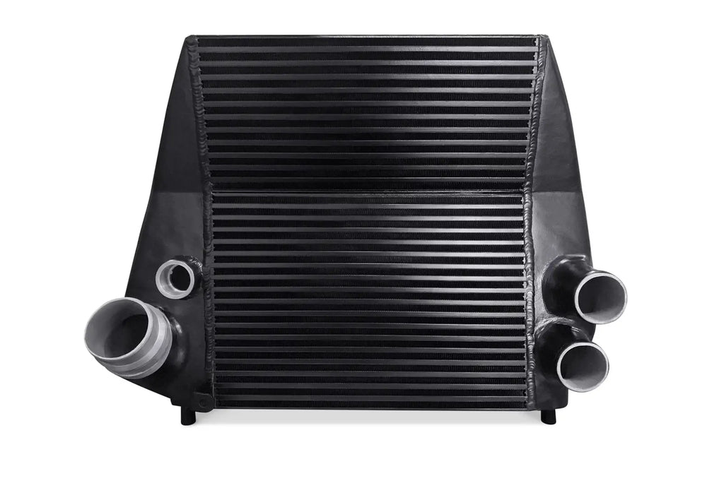 A black radiator is shown with two pipes.