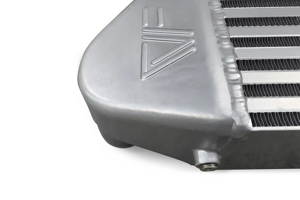 A close up of the side of an aluminum radiator.