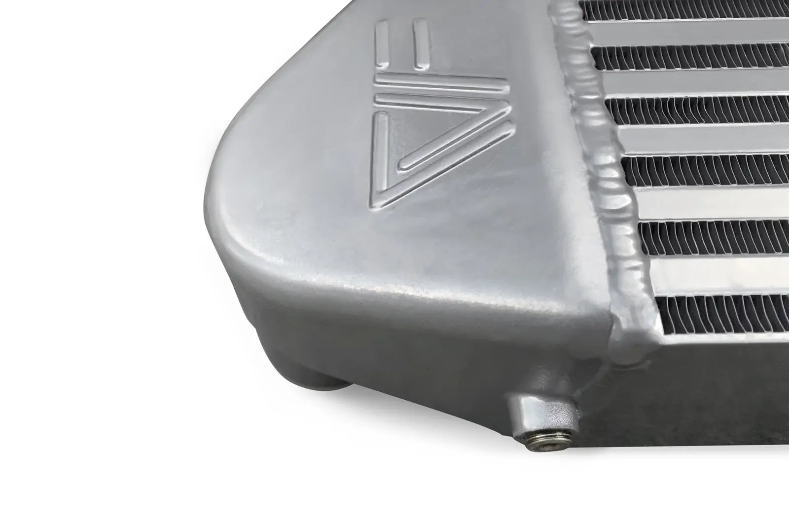 A close up of the side of an aluminum radiator.