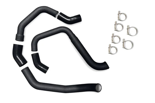 A set of black hose and clamps for an engine.