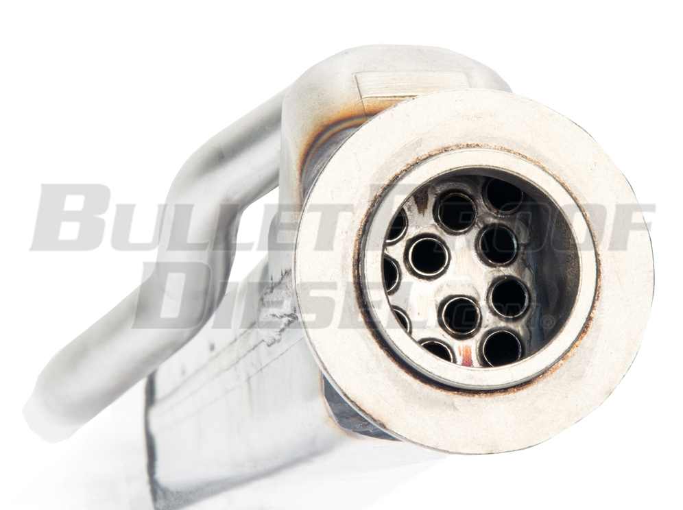 A close up of the bullet hole in the side of a gun.