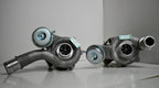 A couple of turbo chargers are on the floor