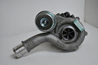 A close up of the side of a turbo charger