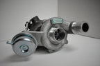A close up of the side of a turbo charger