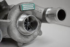 A close up of the side of a turbo charger