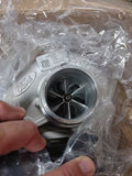 A person holding a turbo in their hand.